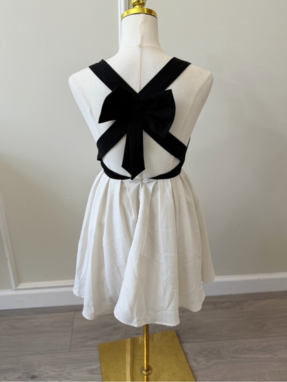 En Creme White Skater Mini Dress with Black Bow Back